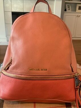 Michael Kors Coral-Pink Leather Backpack with Gold Accents